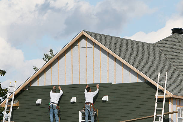 Professional Siding technician working in Cleveland, OH